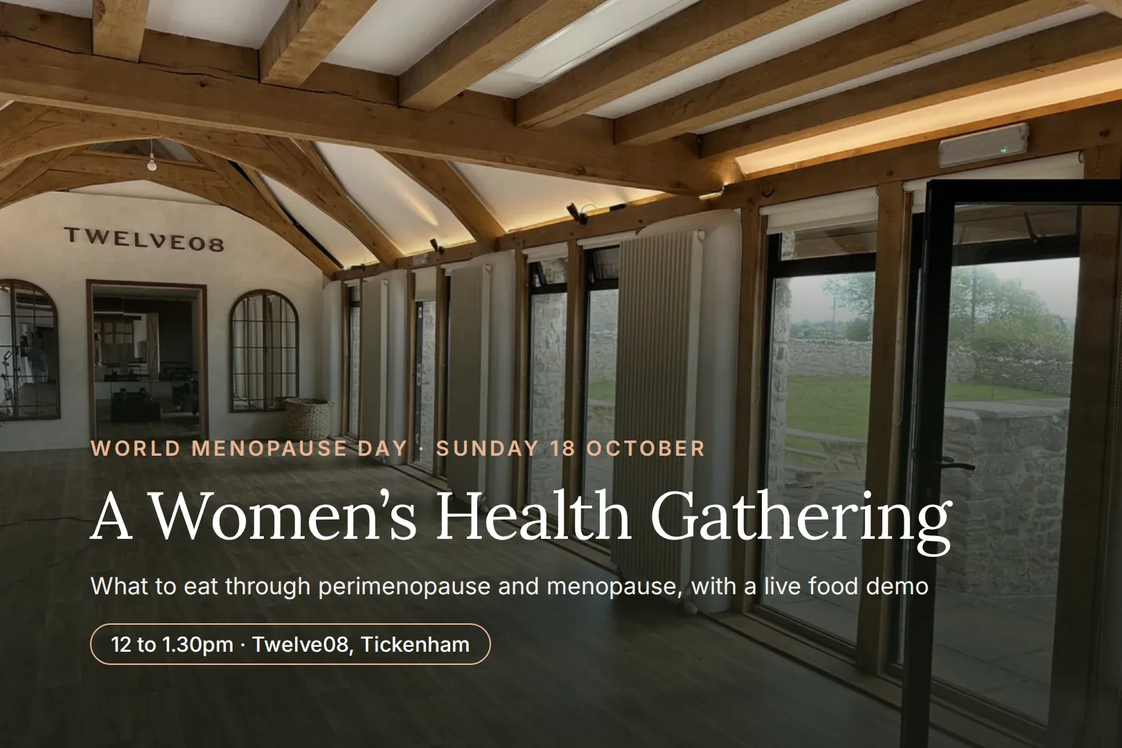 The studio at Twelve08 in Tickenham, a long oak-beamed room with tall windows onto a garden, with the words World Menopause Day, Sunday 18 October, A Women's Health Gathering, what to eat through perimenopause and menopause, with a live food demo, 12 to 1.30pm, Twelve08, Tickenham